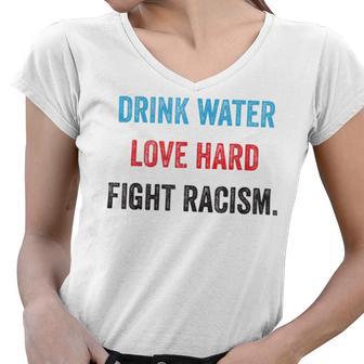 Drink Water Love Hard Fight Racism Women V-Neck T-Shirt | Favorety