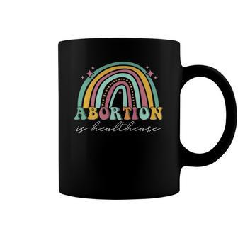 Abortion Is Healthcare Pro Choice Retro Feminism Rainbow Coffee Mug | Mazezy