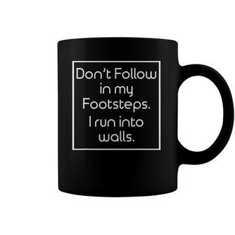 Funny Dont Follow In My Footsteps I Run Into Walls Coffee Mug | Mazezy