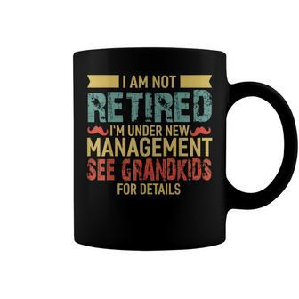 I Am Not Retired Im Under New Management See Grandkids Coffee Mug - Seseable