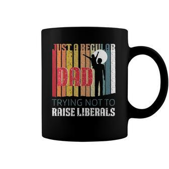 Just A Regular Dad Trying Not To Raise Liberals Fathers Day Coffee Mug | Mazezy