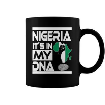 Nigeria Is In My Dna Nigerian Flag Africa Map Raised Fist Coffee Mug | Mazezy AU