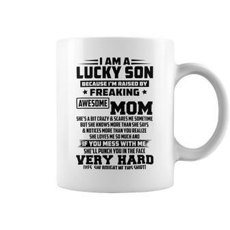 I Am A Lucky Son Because Im Raised By A Freaking Awesome Mom Shes A Bit Crazy And Scares Me Coffee Mug | Favorety DE