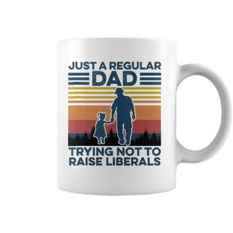 Just A Regular Dad Trying Not To Raise Liberals Fathers Day Coffee Mug | Mazezy UK