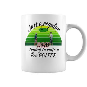 Just A Regular Dad Trying To Raise A Pro Golfer Coffee Mug | Favorety