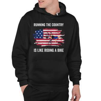 Running The Country Is Like Riding A Bike Funny Biden Bike Hoodie - Thegiftio