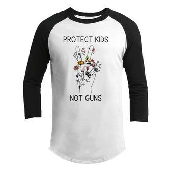 Protect Our Children Not Guns Protect Kids Pray For Uvalde Youth Raglan Shirt | Mazezy