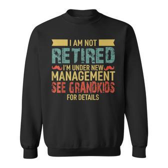 I Am Not Retired Im Under New Management See Grandkids Sweatshirt - Seseable