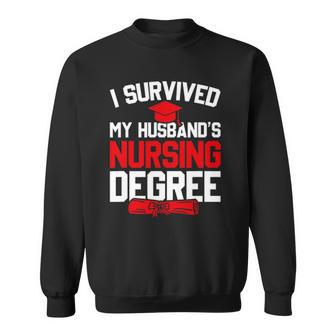 I Survived My Husbands Nursing Degree Funny Graduation Sweatshirt - Thegiftio UK
