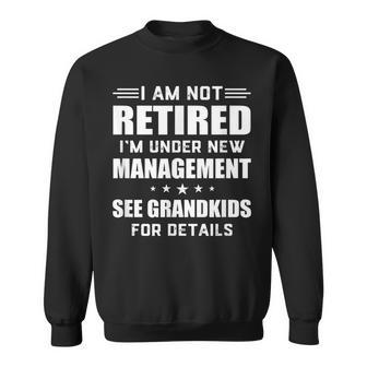 Im Not Retired Im Under New Management See Grandkids Sweatshirt - Seseable