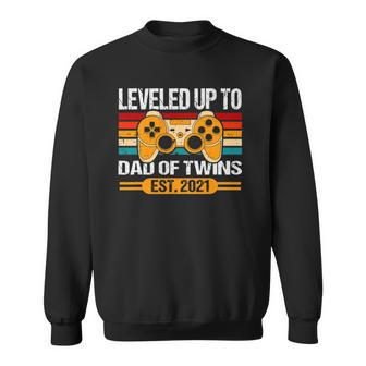 Leveled Up To Dad Of Twins Est 2021 Promoted Daddy Gamer Sweatshirt | Mazezy