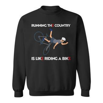 Running The Country Is Like Riding A Bike Joe Biden Funny Sweatshirt - Thegiftio