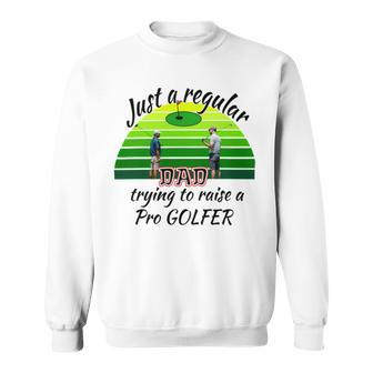 Just A Regular Dad Trying To Raise A Pro Golfer Sweatshirt | Favorety UK