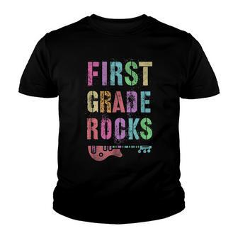 1St Grader Rocks Teacher Rockstar First Grade Is My Jam Youth T-shirt - Thegiftio UK
