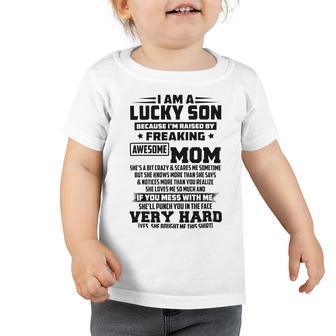 I Am A Lucky Son Because Im Raised By A Freaking Awesome Mom Shes A Bit Crazy And Scares Me Toddler Tshirt | Favorety