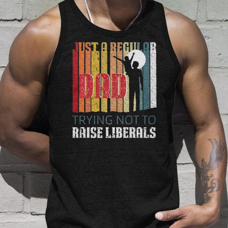 Just A Regular Dad Trying Not To Raise Liberals Fathers Day Tank Top Gifts for Him