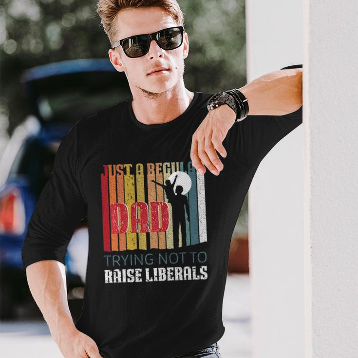 Just A Regular Dad Trying Not To Raise Liberals Fathers Day Long Sleeve T-Shirt T-Shirt Gifts for Him