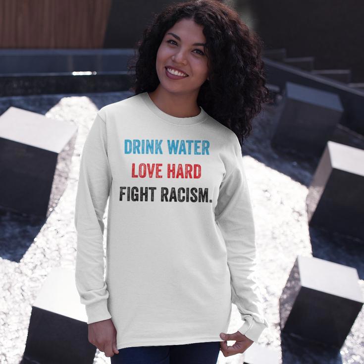 Drink Water Love Hard Fight Racism Unisex Long Sleeve Gifts for Her