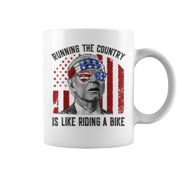 Merry 4Th Of July Joe Biden Falling Off His Bicycle Funny  Coffee Mug