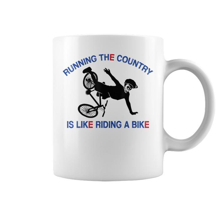 Running The Country Is Like Riding A Bike Funny Ridin  Coffee Mug