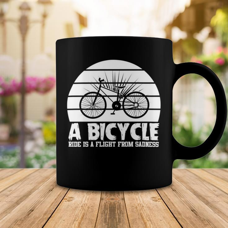 Funny Bicycle I Ride Fun Hobby Race Quote A Bicycle Ride Is A Flight From Sadness Coffee Mug Funny Gifts