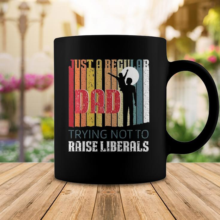 Just A Regular Dad Trying Not To Raise Liberals Fathers Day Coffee Mug Unique Gifts