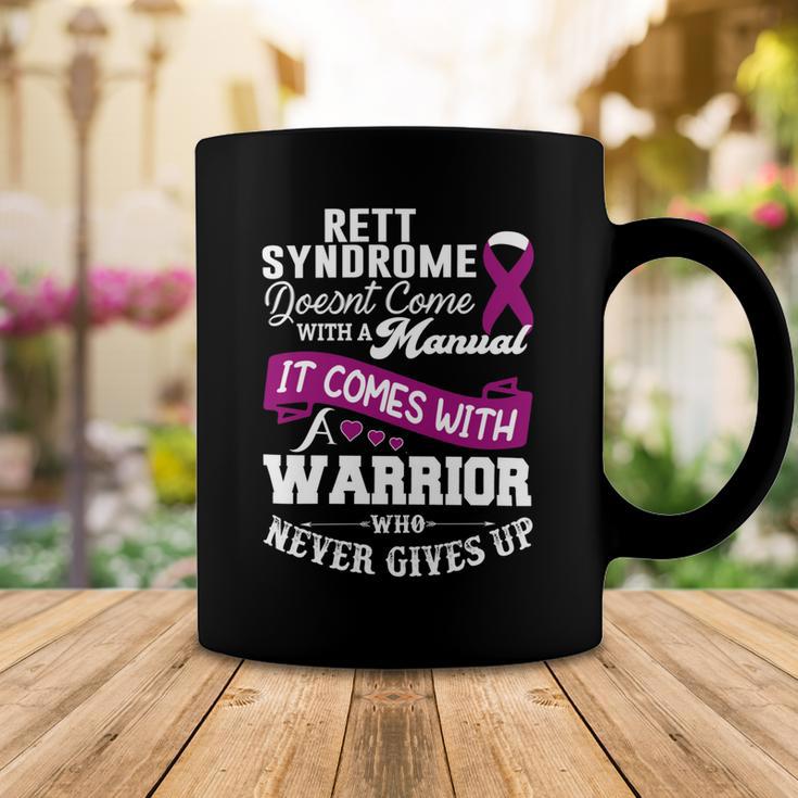 Rett Syndrome Doesnt Come With A Manual It Comes With A Warrior Who Never Gives Up Purple Ribbon Rett Syndrome Rett Syndrome Awareness Coffee Mug Funny Gifts