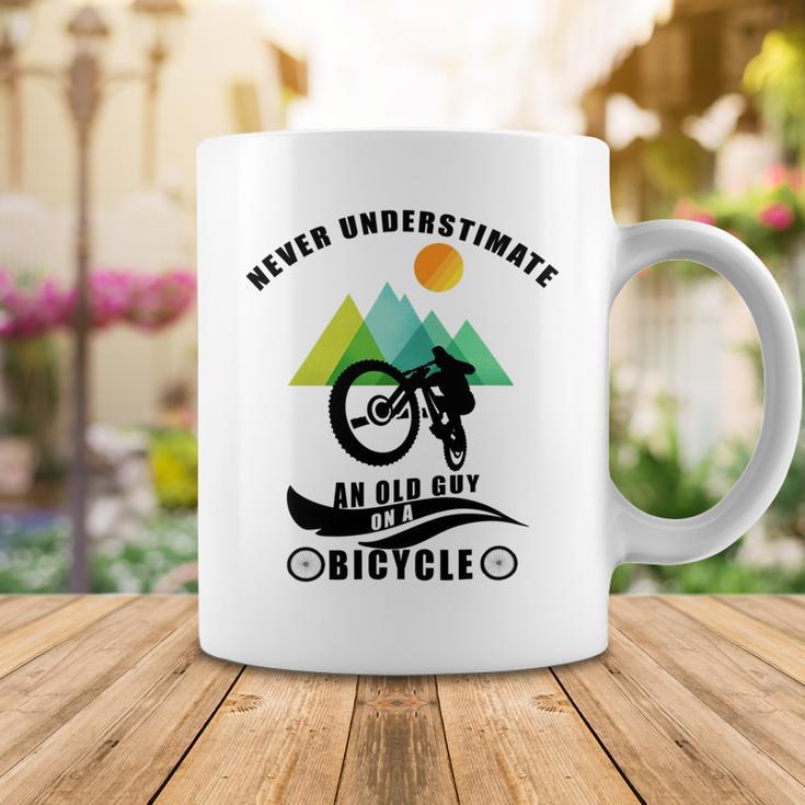 Never Underestimate An Old Guy On A Bicycle Coffee Mug Funny Gifts