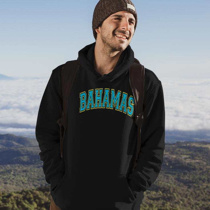 Bahamas Varsity Style Teal Text With Yellow Outline Hoodie Lifestyle