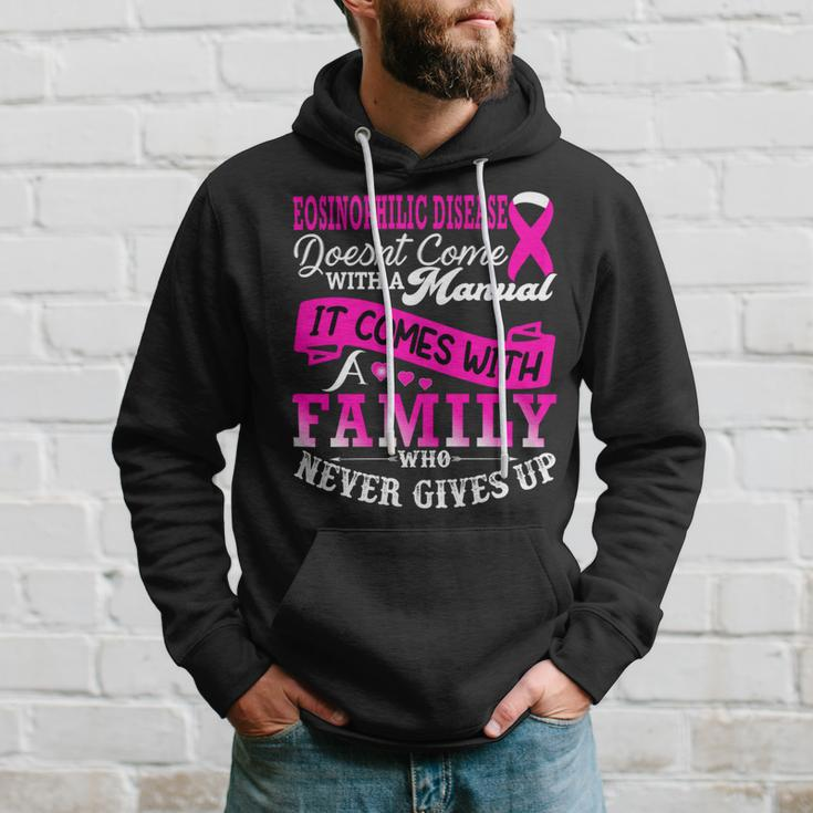 Eosinophilic Disease Doesnt Come With A Manual It Comes With A Family Who Never Gives Up Pink Ribbon Eosinophilic Disease Eosinophilic Disease Awareness Hoodie Gifts for Him