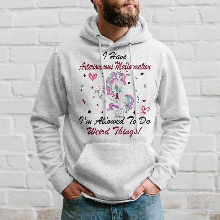 I Have Arteriovenous Malformation Im Allowed To Do Weird Things Funny Unicorn Burgundy Ribbon Arteriovenous Malformation Support Arteriovenous Malformation Awareness Hoodie Gifts for Him