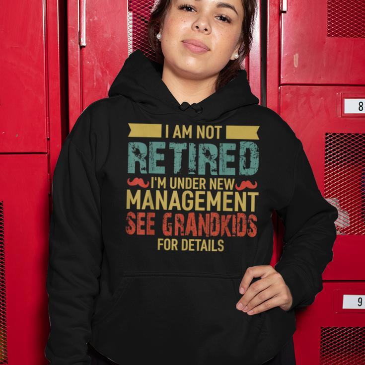 I Am Not Retired Im Under New Management See Grandkids Women Hoodie Funny Gifts