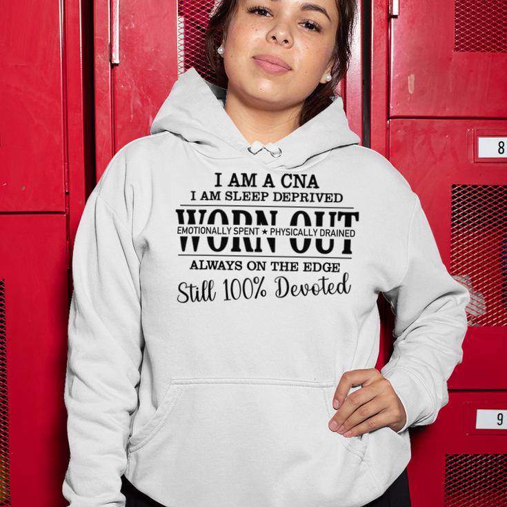 I Am Cna I Am Sleep Deprived Worn Out Always On The Edge Still 100 Devoted V2 Women Hoodie Funny Gifts