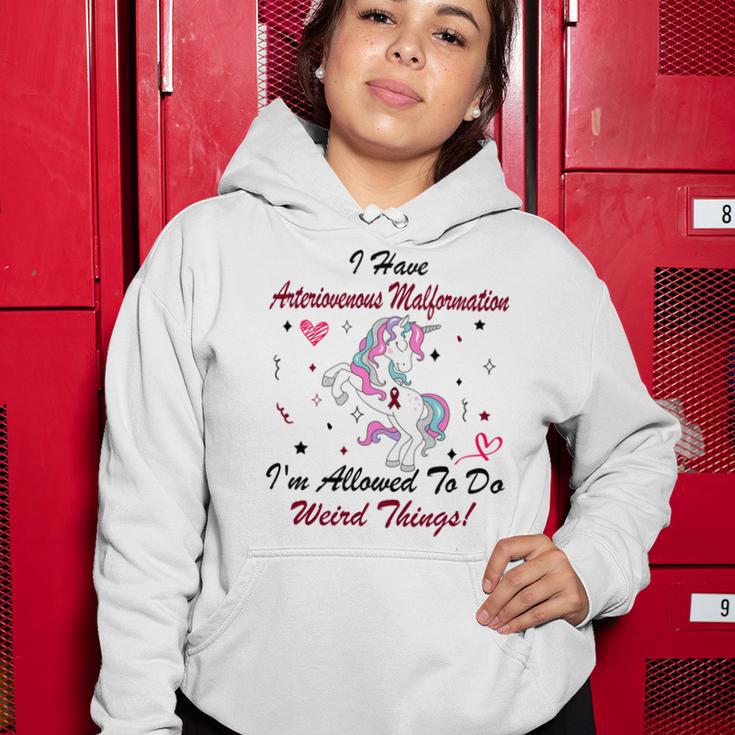 I Have Arteriovenous Malformation Im Allowed To Do Weird Things Funny Unicorn Burgundy Ribbon Arteriovenous Malformation Support Arteriovenous Malformation Awareness Women Hoodie Funny Gifts