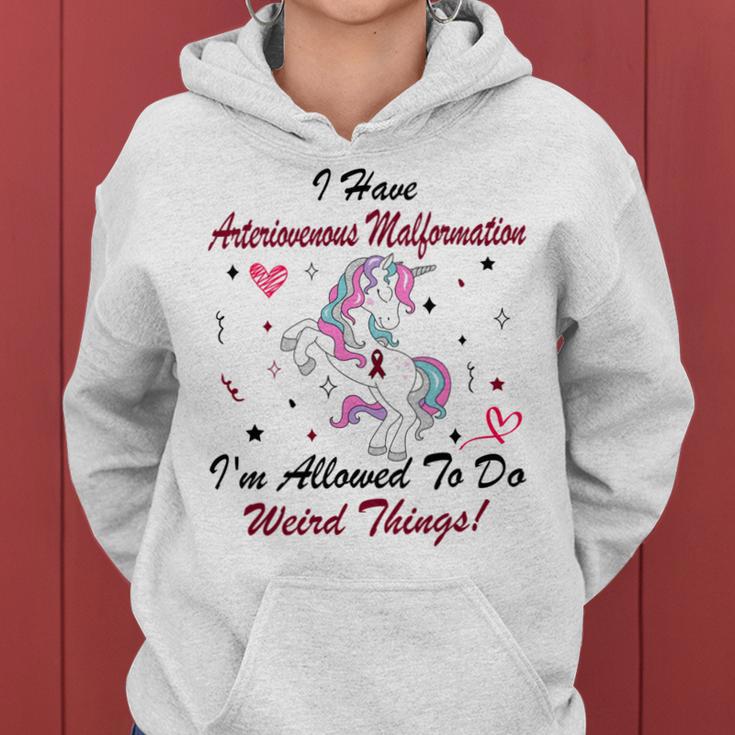 I Have Arteriovenous Malformation Im Allowed To Do Weird Things Funny Unicorn Burgundy Ribbon Arteriovenous Malformation Support Arteriovenous Malformation Awareness Women Hoodie