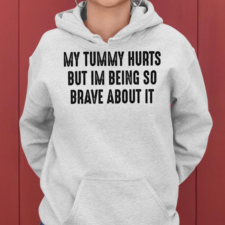 My Tummy Hurts But Im Being So Brave About It Women Hoodie