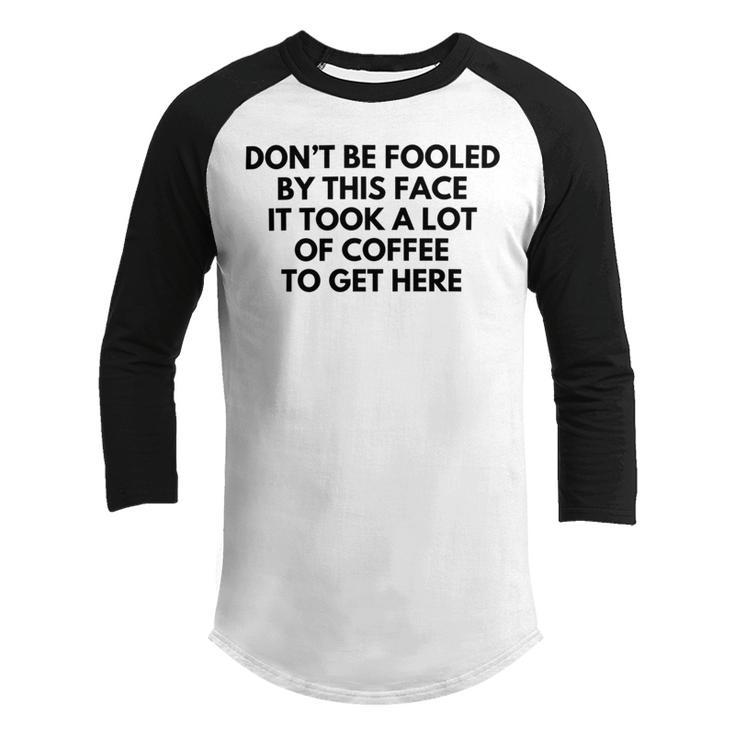 Dont Be Fooled By This Face It Took A Lot Of Coffee To Get Here Youth Raglan Shirt