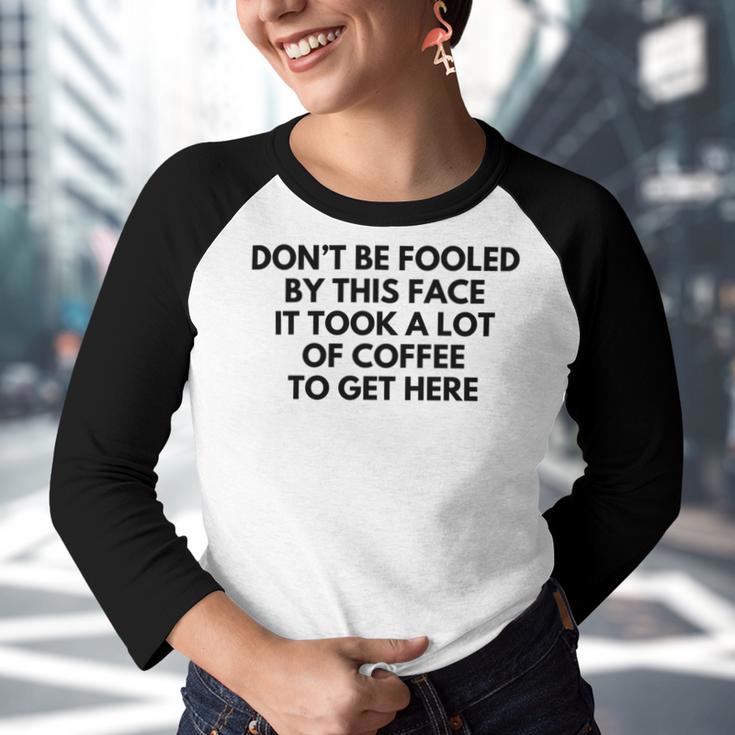 Dont Be Fooled By This Face It Took A Lot Of Coffee To Get Here Youth Raglan Shirt