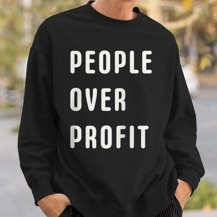 People Over Profit Anti Capitalism Protest Raglan Baseball Tee Sweatshirt Gifts for Him
