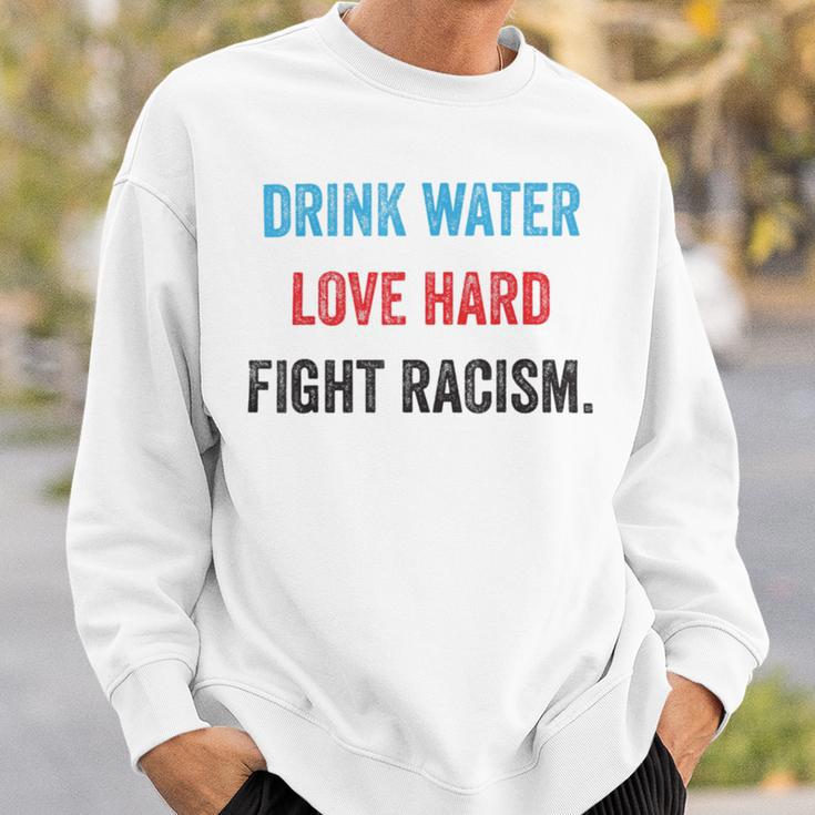 Drink Water Love Hard Fight Racism Sweatshirt Gifts for Him