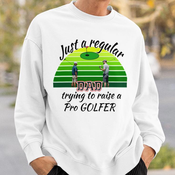 Just A Regular Dad Trying To Raise A Pro Golfer Sweatshirt Gifts for Him