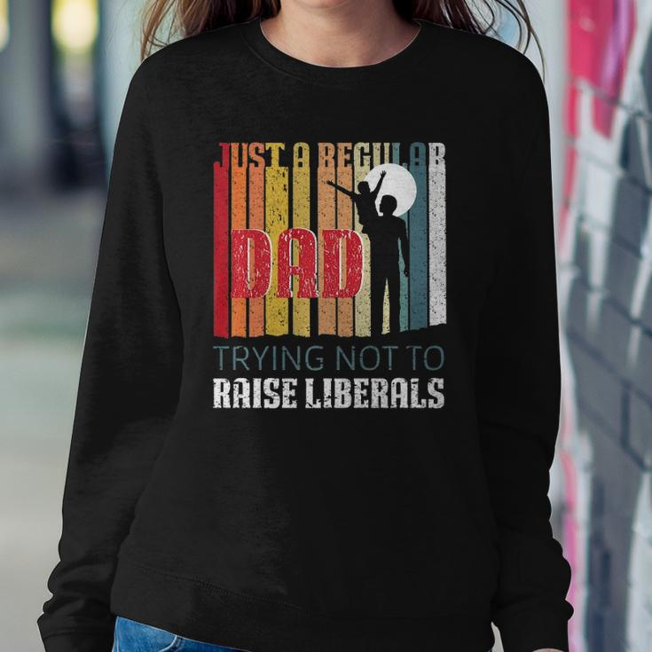Just A Regular Dad Trying Not To Raise Liberals Fathers Day Sweatshirt Gifts for Her