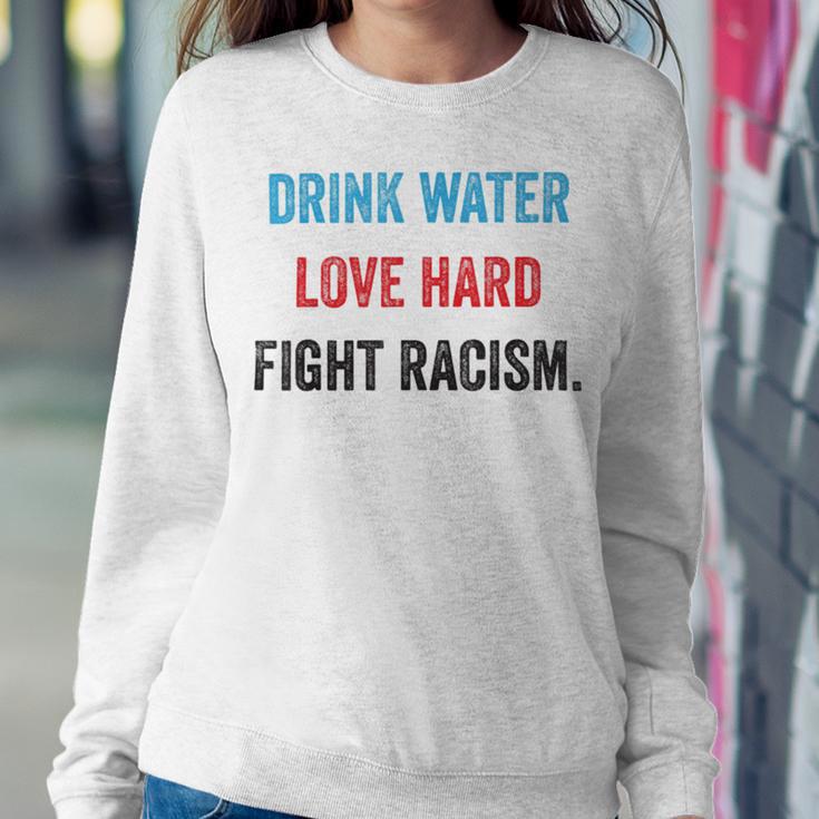 Drink Water Love Hard Fight Racism Sweatshirt Gifts for Her