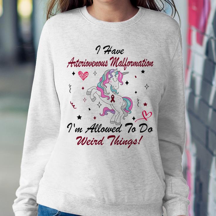 I Have Arteriovenous Malformation Im Allowed To Do Weird Things Funny Unicorn Burgundy Ribbon Arteriovenous Malformation Support Arteriovenous Malformation Awareness Sweatshirt Gifts for Her