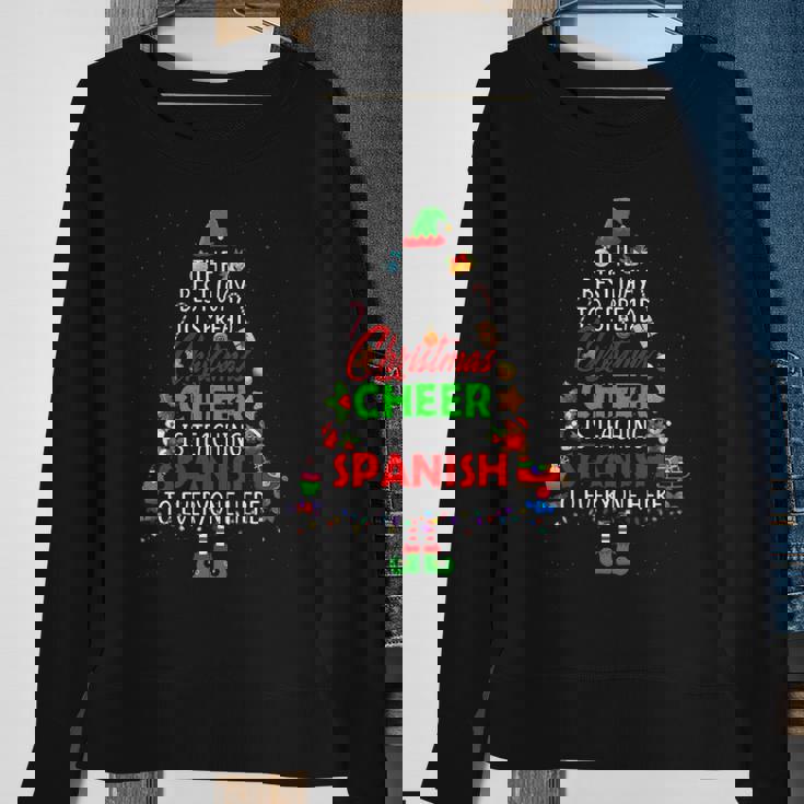 Christmas Cheer Is Teaching Spanish Santa Elf Teacher Group Sweatshirt Gifts for Old Women