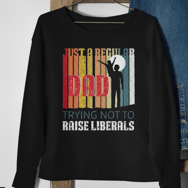 Just A Regular Dad Trying Not To Raise Liberals Fathers Day Sweatshirt Gifts for Old Women