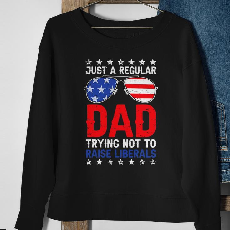 Just A Regular Dad Trying Not To Raise Liberals Voted Trump Sweatshirt Gifts for Old Women