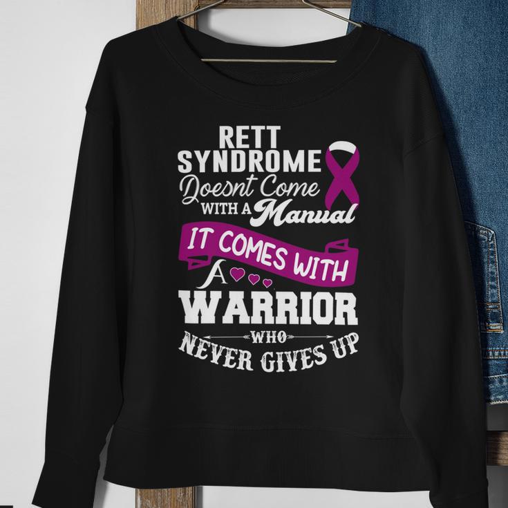 Rett Syndrome Doesnt Come With A Manual It Comes With A Warrior Who Never Gives Up Purple Ribbon Rett Syndrome Rett Syndrome Awareness Sweatshirt Gifts for Old Women