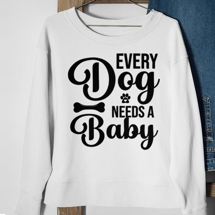 Every Dog Needs A Baby 768 Trending Shirt Sweatshirt Gifts for Old Women