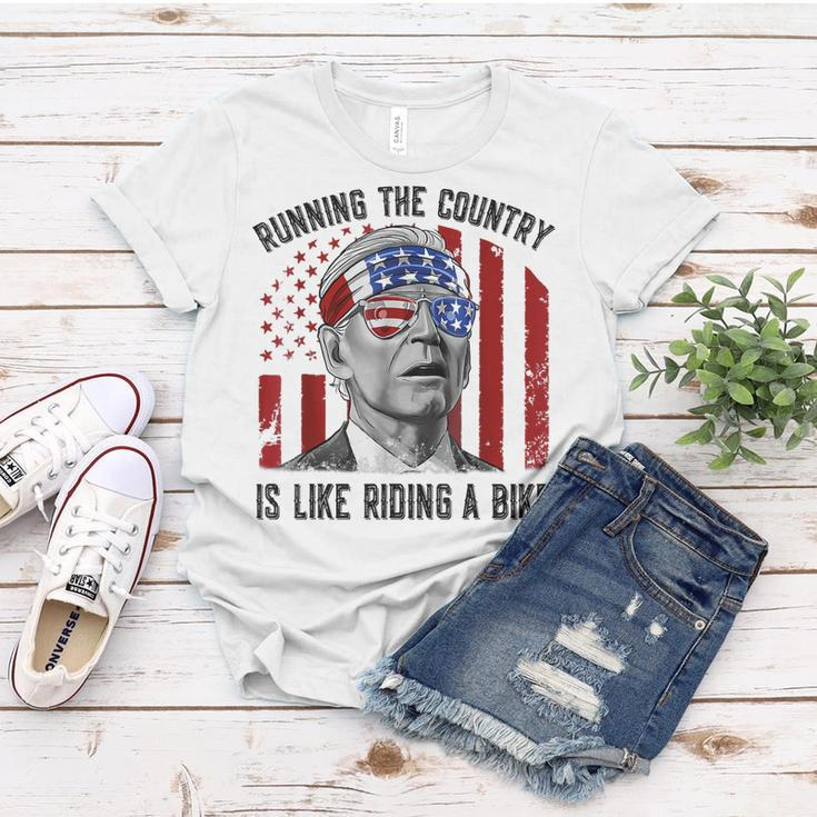 Merry 4Th Of July Joe Biden Falling Off His Bicycle Funny Women T-shirt Funny Gifts